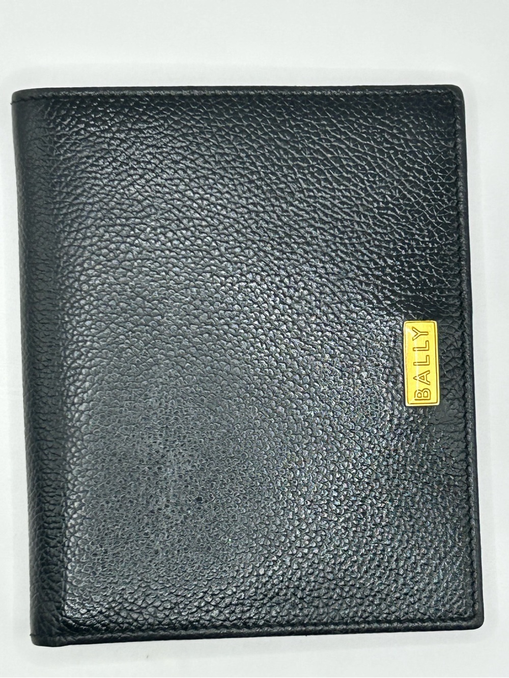 Bally Black Pebbled Leather Wallet with Gold Logo Plaque